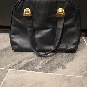 Chic Black Leather Shoulder Bag with Gold Accents